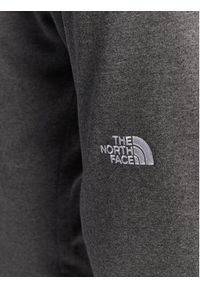 The North Face Spodnie dresowe Nse Light NF0A4T1F Szary Regular Fit. Kolor: szary. Materiał: syntetyk