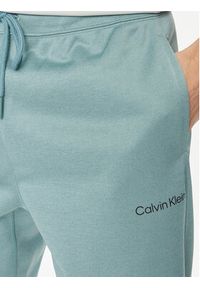 Calvin Klein Performance Spodnie dresowe 00GMF3P613 Niebieski Regular Fit. Kolor: niebieski. Materiał: dresówka, syntetyk