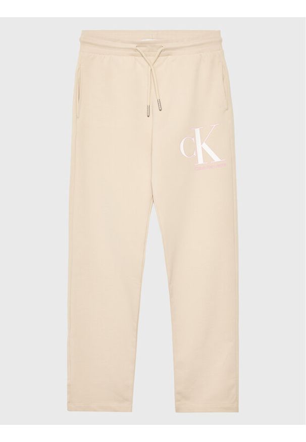 Calvin Klein Jeans Spodnie dresowe Monogram IG0IG01985 Beżowy Regular Fit. Kolor: beżowy. Materiał: bawełna