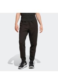 Adidas - Spodnie fitness damskie ADIDAS. Kolor: czarny. Materiał: materiał. Sport: fitness #1