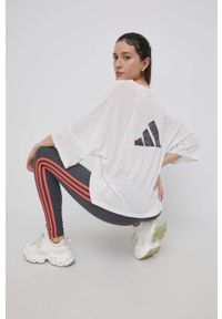 Adidas - adidas legginsy HD1831 damskie kolor szary melanżowe. Stan: podwyższony. Kolor: szary. Materiał: bawełna, dzianina, materiał. Wzór: melanż