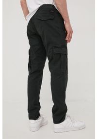 Superdry spodnie męskie kolor czarny dopasowane. Kolor: czarny. Materiał: tkanina