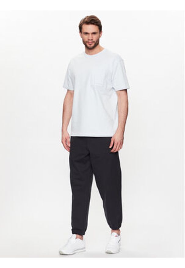 New Balance T-Shirt MT23567 Niebieski Relaxed Fit. Kolor: niebieski. Materiał: bawełna