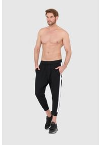 DSQUARED2 Czarne męskie dresy z białymi lampasami, Rozmiar S. Kolor: czarny. Materiał: dresówka, bawełna