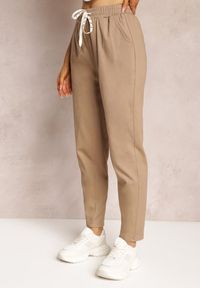 Renee - Beżowe Bawełniane Spodnie Dresowe z Gumką w Talii Arnhill. Stan: podwyższony. Kolor: beżowy. Materiał: dresówka, bawełna
