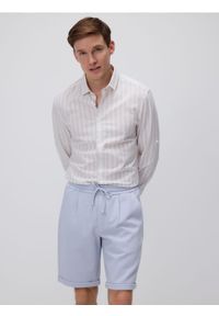 Reserved - Szorty regular fit - jasnoniebieski. Kolor: niebieski. Materiał: bawełna, dzianina