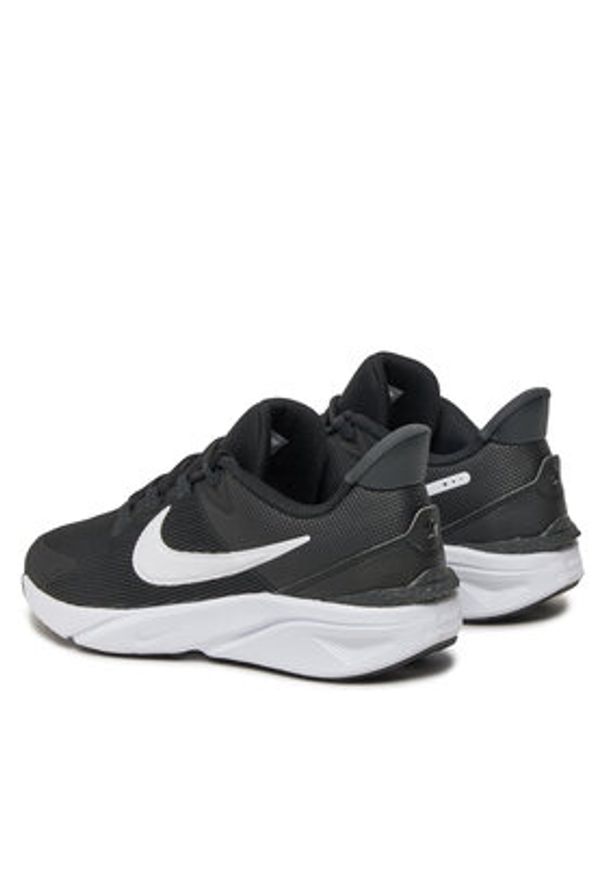 Nike Buty do biegania Star Runner 4 DX7615 001 Czarny. Kolor: czarny. Materiał: materiał