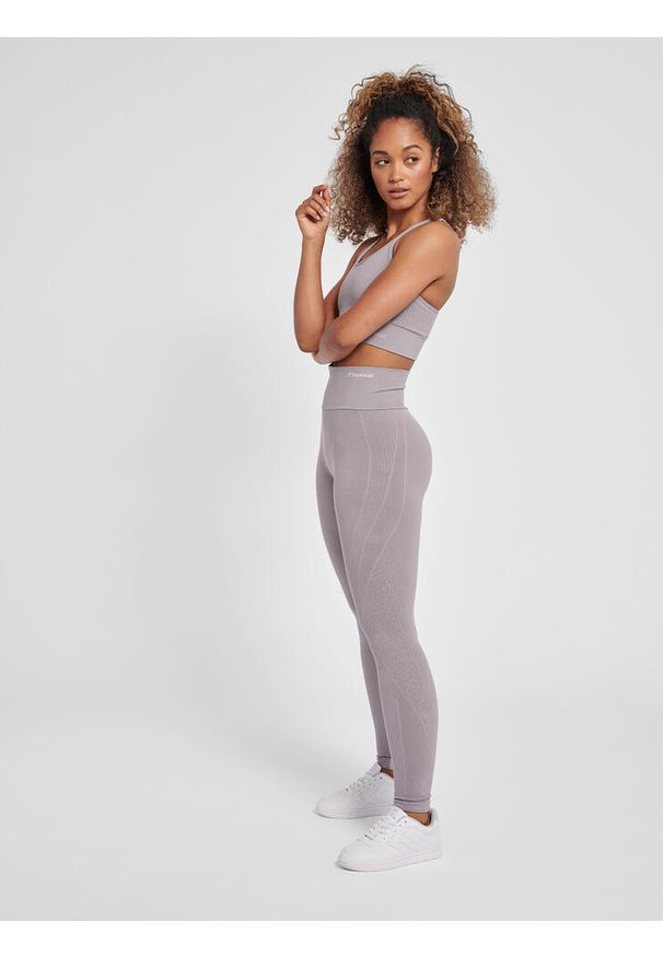 Legginsy damskie Hummel MT Flow. Kolor: fioletowy, niebieski, wielokolorowy. Materiał: dzianina. Sport: joga i pilates