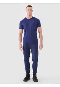 4f - 4F Spodnie treningowe szybkoschnące męskie - granatowe 3XL. Kolor: niebieski. Materiał: materiał, syntetyk, dresówka, dzianina, włókno, elastan. Wzór: ze splotem, jednolity. Sport: fitness #1