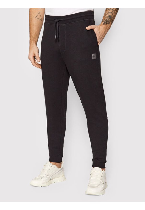 BOSS - Spodnie dresowe Boss. Kolor: czarny. Materiał: dresówka