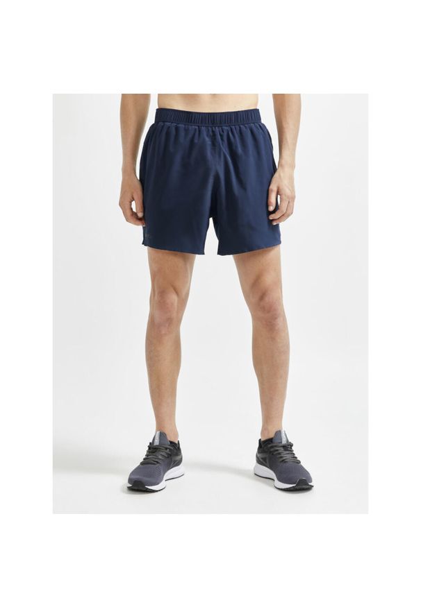 Szorty Craft ADV Essence 5" stretch. Kolor: wielokolorowy, niebieski, czerwony. Materiał: poliester