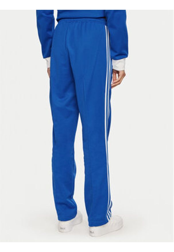 Adidas - adidas Spodnie dresowe Beckenbauer IY2228 Niebieski Regular Fit. Kolor: niebieski. Materiał: bawełna, syntetyk