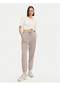 Under Armour Spodnie dresowe Ua Rival 1382735 Beżowy Loose Fit. Kolor: beżowy. Materiał: bawełna #5