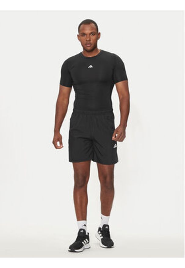 Adidas - adidas Szorty sportowe Train Essentials Woven Training Shorts IC6976 Czarny Regular Fit. Kolor: czarny. Materiał: syntetyk. Styl: sportowy