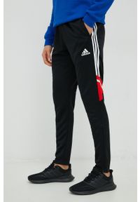 adidas Performance spodnie treningowe Messi męskie kolor czarny z nadrukiem. Kolor: czarny. Materiał: skóra, dzianina, materiał. Wzór: nadruk. Sport: fitness #1