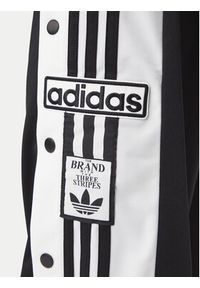 Adidas - adidas Spodnie dresowe Adibreak Classic KD4094 Czarny Regular Fit. Kolor: czarny. Materiał: syntetyk #5
