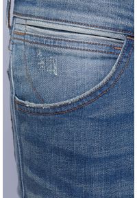 Wrangler - Jeansy Bryson Cross Grain. Kolor: niebieski. Materiał: jeans. Wzór: aplikacja #4