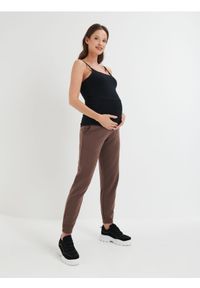 Sinsay - Spodnie dresowe MAMA - brązowy. Kolor: brązowy. Materiał: dresówka