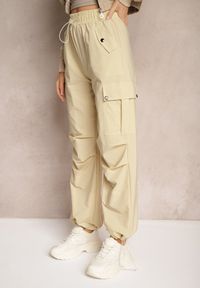 Renee - Beżowe Spodnie Cargo High Waist z Ozdobnymi Kieszeniami Leriora. Okazja: na co dzień. Stan: podwyższony. Kolor: beżowy. Styl: elegancki, casual #5