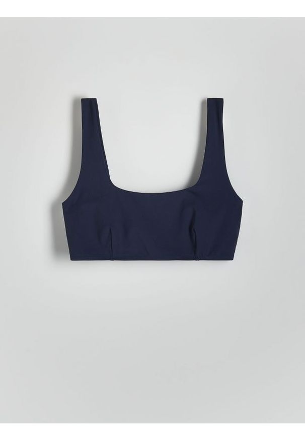 Reserved - Top bikini - granatowy. Kolor: niebieski. Materiał: materiał. Wzór: gładki