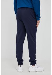 Lacoste Spodnie męskie kolor granatowy z nadrukiem. Kolor: niebieski. Materiał: dzianina. Wzór: nadruk #4