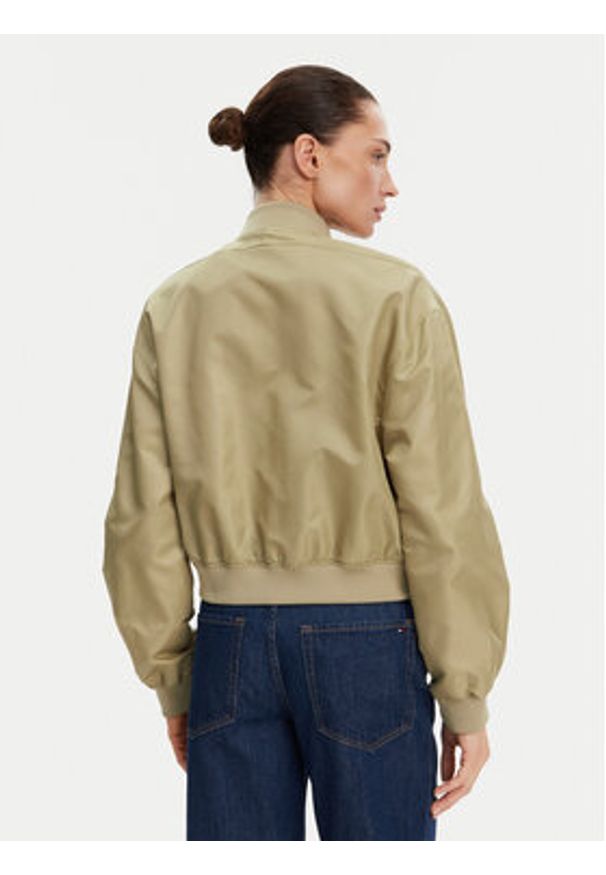 Calvin Klein Jeans Kurtka bomber Hero LV047B528G Beżowy Relaxed Fit. Kolor: beżowy. Materiał: syntetyk