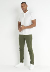 Born2be - Ciemnozielone Spodnie Slim Ridhi. Kolor: zielony. Długość: długie. Wzór: jednolity #2