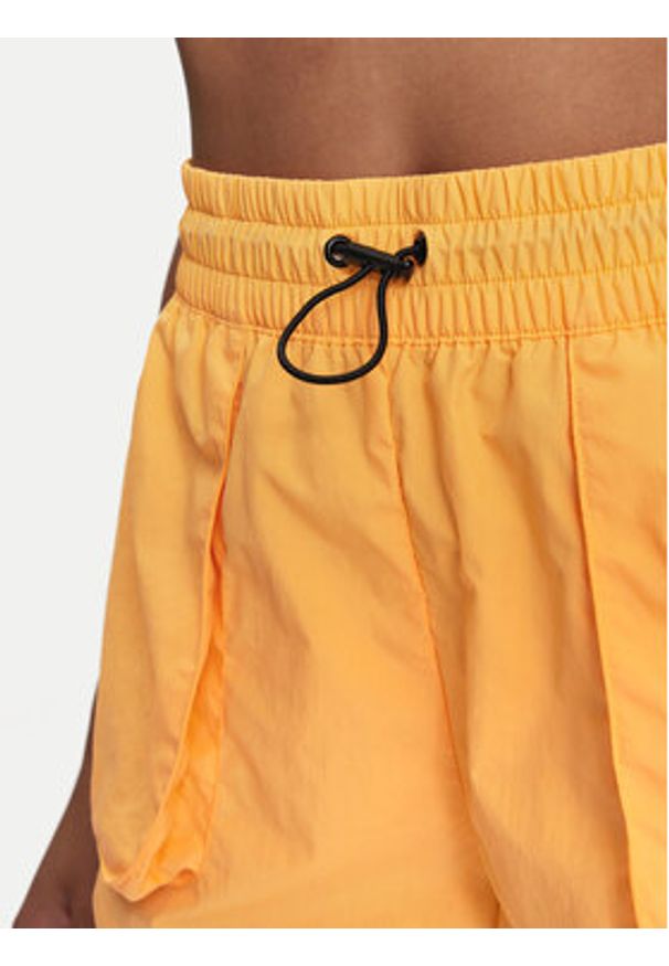 Adidas - adidas Szorty sportowe City Escape Summer IS0662 Żółty Loose Fit. Kolor: żółty. Materiał: syntetyk