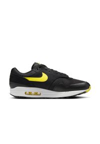 Nike Air Max 1 "Batman" Sneakersy męskie. Okazja: na co dzień. Kolor: czarny. Materiał: materiał, zamsz, skóra. Szerokość cholewki: normalna. Wzór: motyw z bajki. Model: Nike Air Max