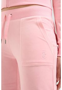 Juicy Couture - JUICY COUTURE Różowe damskie spodnie dresowe Layla Low Rise, Rozmiar M. Kolor: różowy. Materiał: dresówka