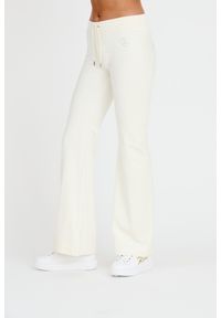 Juicy Couture - JUICY COUTURE Spodnie ecru Rodeo Layla Pant. Kolor: beżowy. Materiał: dresówka