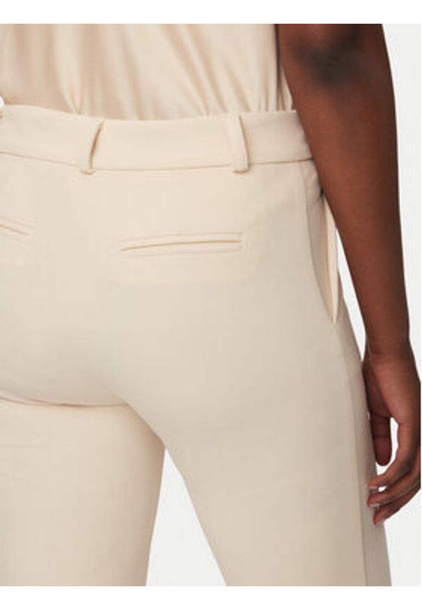 Rinascimento Spodnie materiałowe CFC0127865003 Beżowy Slim Fit. Kolor: beżowy. Materiał: syntetyk