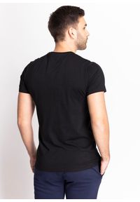 Koszulka męska Lacoste T-Shirt (TH6709-031). Typ kołnierza: polo. Kolor: czarny. Materiał: dzianina. Długość: krótkie. Sezon: lato. Sport: bieganie