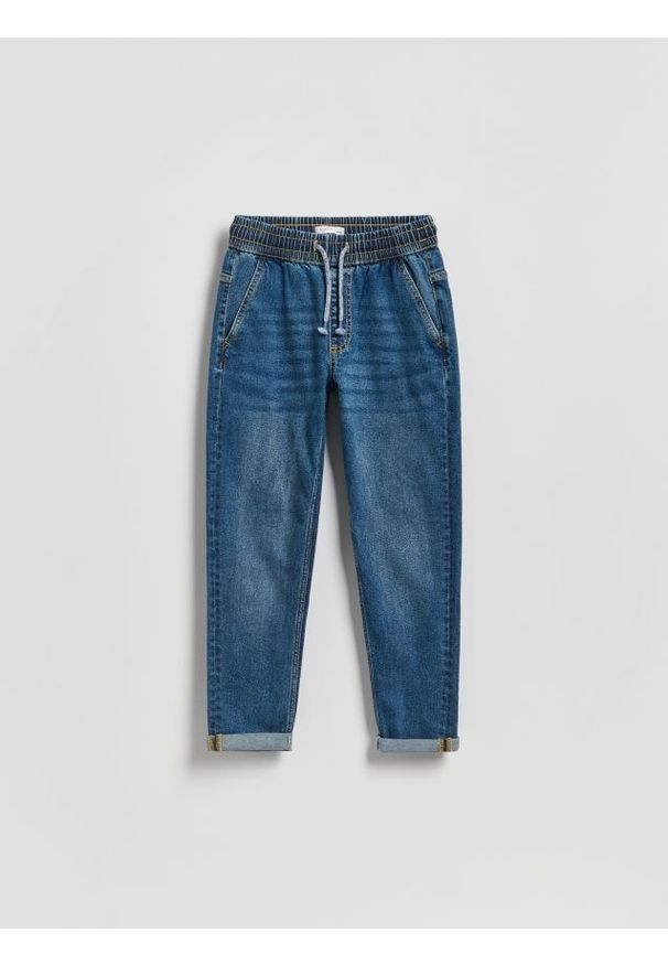 Reserved - Jeansy carrot fit - niebieski. Kolor: niebieski