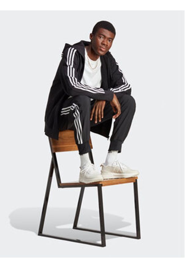 Adidas - adidas Spodnie dresowe AEROREADY Essentials Tapered Cuff Woven 3-Stripes Joggers IC0041 Czarny Regular Fit. Kolor: czarny. Materiał: syntetyk