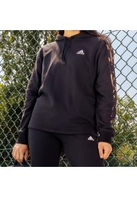 Bluza z kapturem damska Adidas Gym & Pilates. Typ kołnierza: kaptur. Kolor: czarny. Materiał: włókno, bawełna, materiał. Wzór: paski. Sport: joga i pilates #1