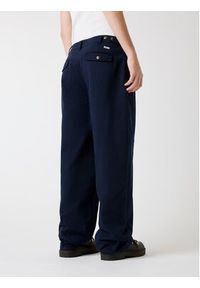 Guess Jeans Spodnie materiałowe 180376 Niebieski Regular Fit. Kolor: niebieski. Materiał: materiał #6