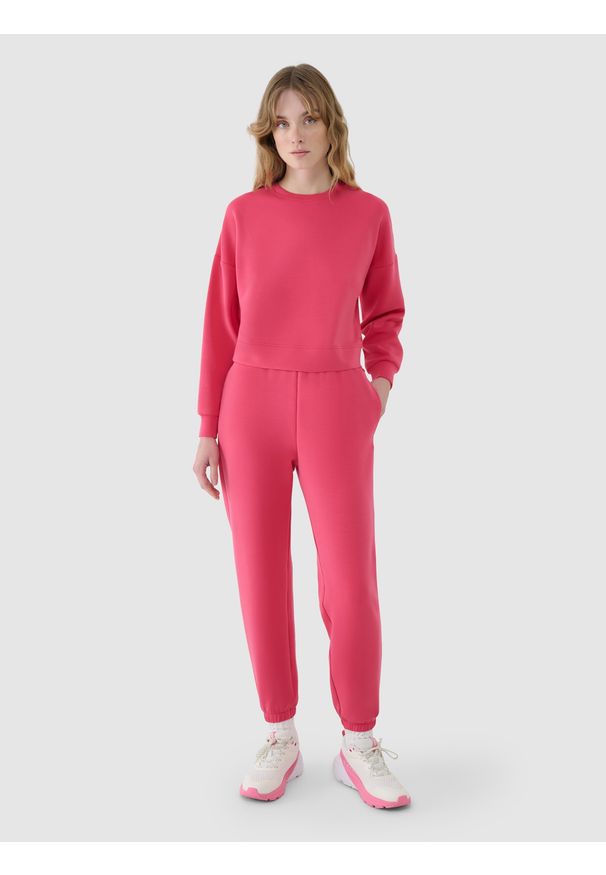 4f - 4F Spodnie dresowe joggery z modalem damskie - różowe XXL. Kolor: różowy. Materiał: dresówka. Wzór: gładki, ze splotem. Sport: fitness