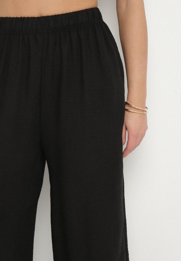 Born2be - Czarne Szerokie Spodnie Typu Palazzo z Wysokim Stanem Sellevia. Okazja: na co dzień. Stan: podwyższony. Kolor: czarny. Styl: klasyczny, casual, elegancki