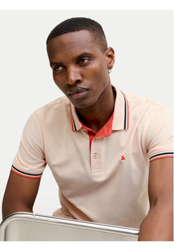 Jack & Jones Polo Paulos 12136668 Pomarańczowy jasny Regular Fit. Typ kołnierza: polo. Kolor: pomarańczowy. Materiał: bawełna
