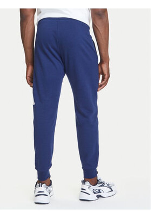 Adidas - adidas Spodnie dresowe Essentials Big Logo JE8967 Granatowy Regular Fit. Kolor: niebieski. Materiał: bawełna