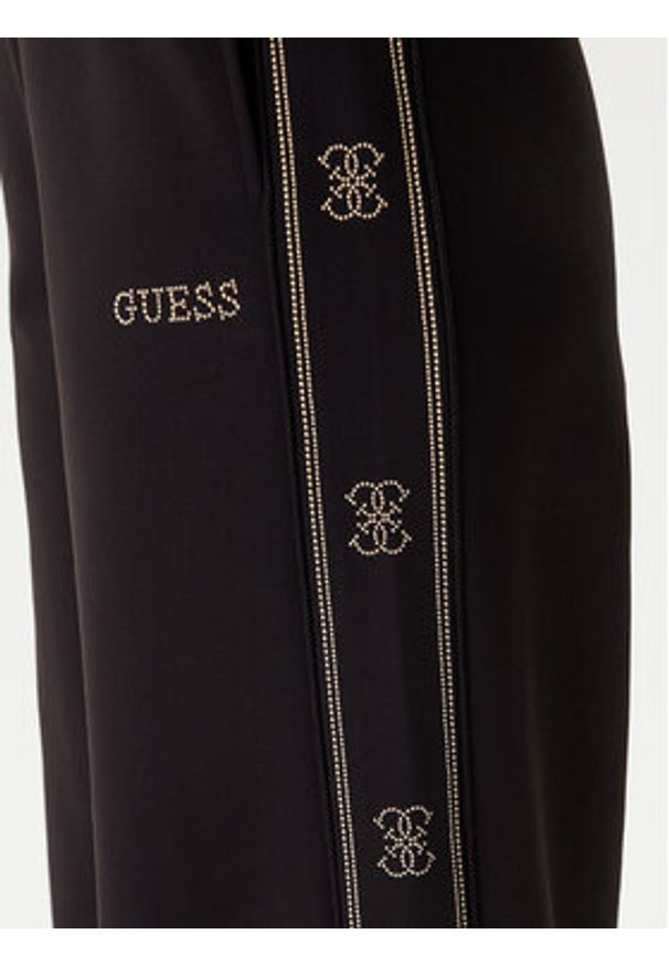 Guess Spodnie dresowe V5BB12 KCX22 Czarny Wide Leg. Kolor: czarny. Materiał: syntetyk