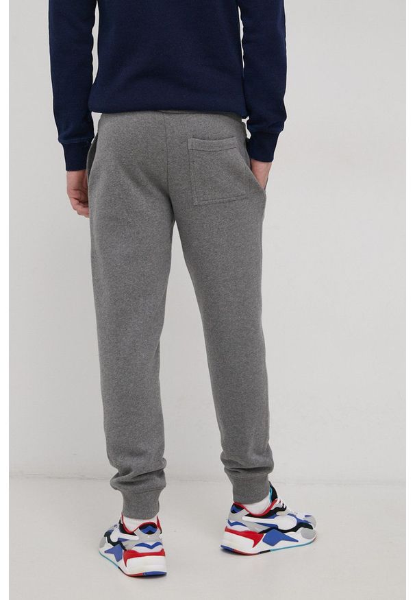 Superdry Spodnie męskie kolor szary melanżowe. Kolor: szary. Materiał: dzianina. Wzór: melanż