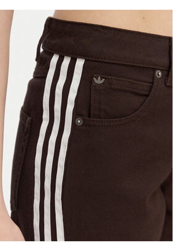 Adidas - adidas Jeansy Firebird KD2934 Brązowy Loose Fit. Kolor: brązowy