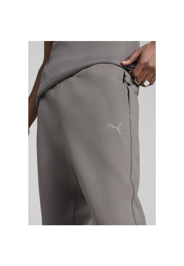Puma - Męskie spodnie EVOSTRIPE PUMA Cast Iron Gray. Kolor: szary
