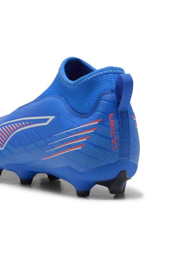 Puma - Młodzieżowe buty piłkarskie ULTRA 6 MATCH+ FG/AG bez sznurowadeł PUMA. Kolor: czerwony, niebieski, wielokolorowy, biały. Szerokość cholewki: normalna. Sport: piłka nożna