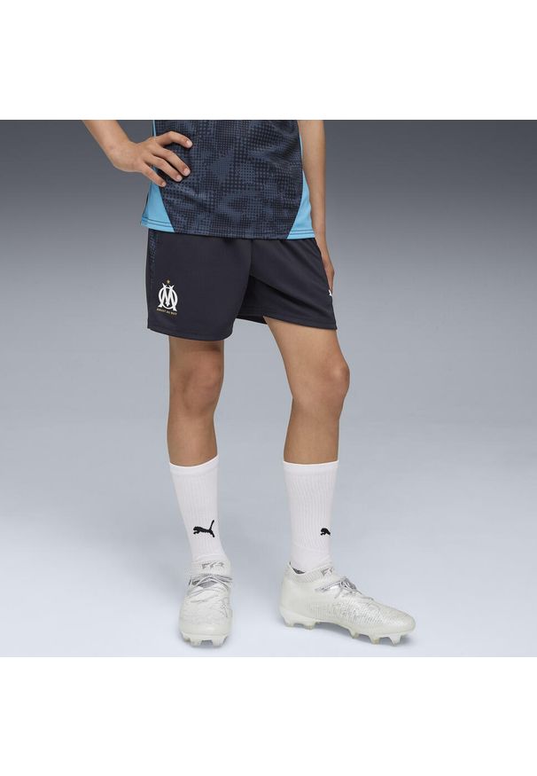 Puma - Młodzieżowe spodnie treningowe Olympique Marsylia PUMA New Navy White Blue. Kolor: niebieski, wielokolorowy, biały. Sport: piłka nożna