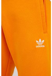 adidas Originals spodnie dresowe HG3902 męskie kolor pomarańczowy gładkie. Kolor: pomarańczowy. Materiał: dresówka. Wzór: gładki #2