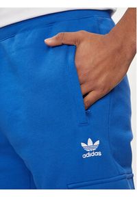 Adidas - adidas Spodnie dresowe adicolor Trefoil IP2758 Niebieski Slim Fit. Kolor: niebieski. Materiał: bawełna