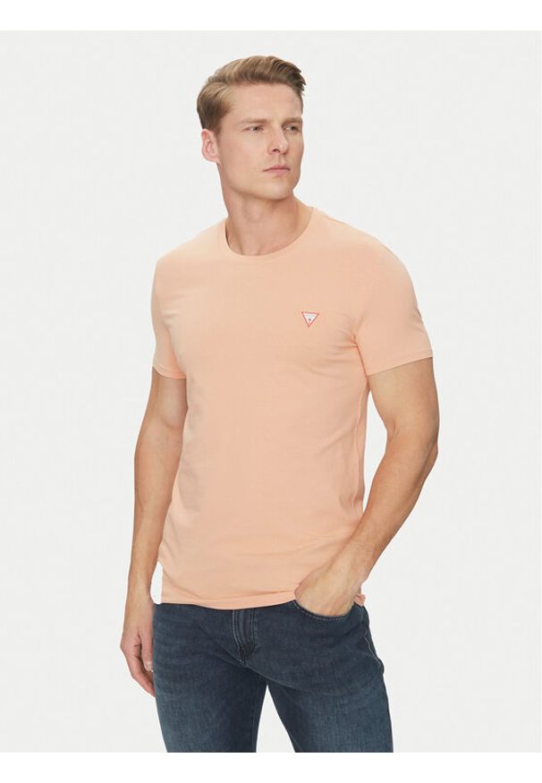 Guess T-Shirt M2YI24 J1314 Pomarańczowy Slim Fit. Kolor: pomarańczowy. Materiał: bawełna